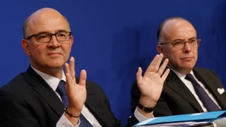 Frankreichs Finanzminister Pierre Moscovici (links) und Budgetminister Bernard Cazeneuve präsentieren das Budget 2014.