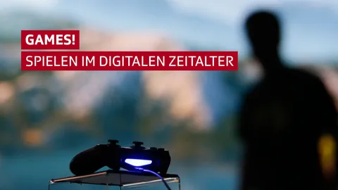 Ein Game-Controller, dahinter unscharf die Silhouette einer Person.