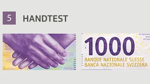 Hände auf 1000er-Note