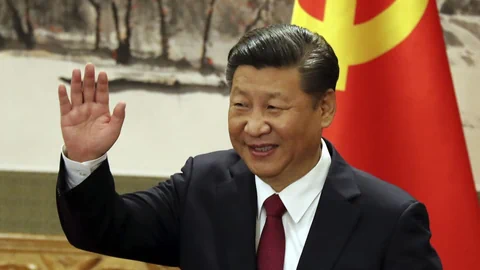 Xi vor einer China-Fahne (Symbolbild).