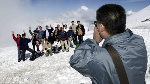 Chinesen beim Fotografieren auf dem Titlis.