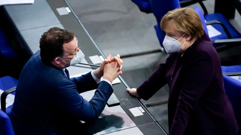 Spahn und Merkel.