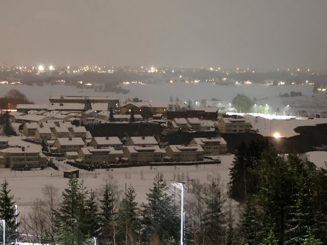 Snowy town in the dark