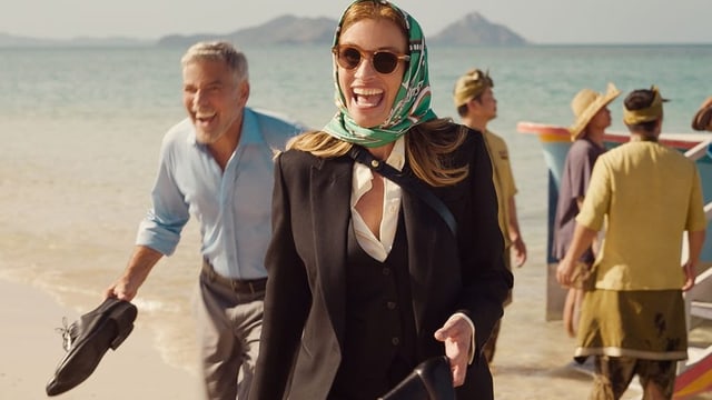 Julia Roberts und George Clooney an einem Strand in Bali.