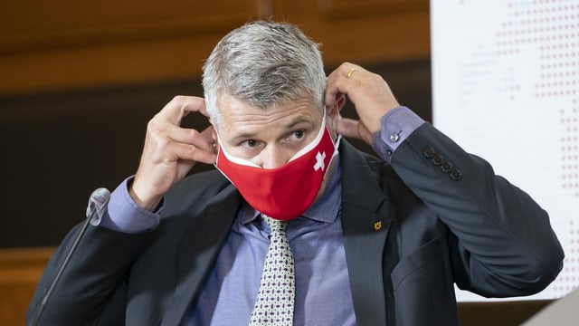 A man with a red mask.