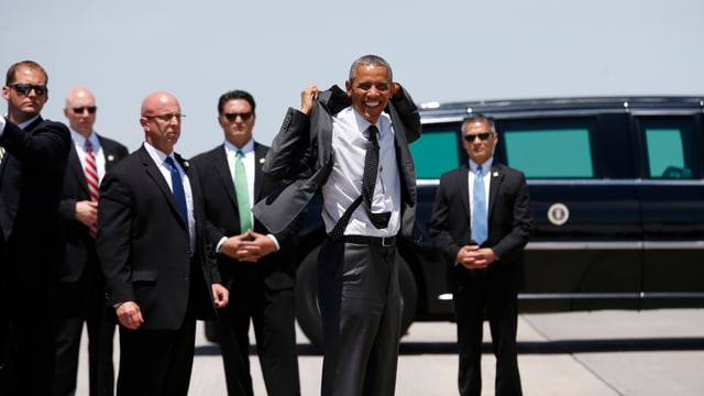 Barack Obama und Mitarbeiter des Secret Service.