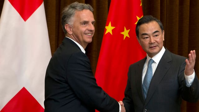 Burkhalter und Wang.