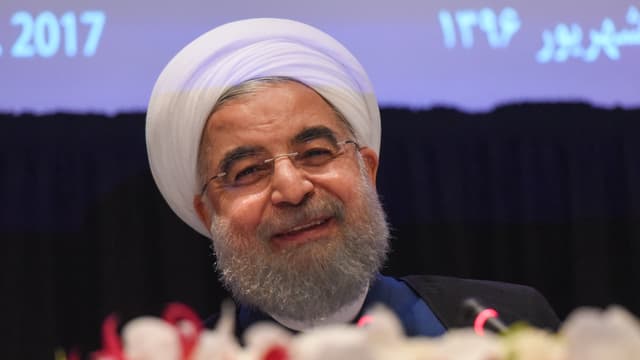 Irans Präsident Hassan Rohani lächelt.