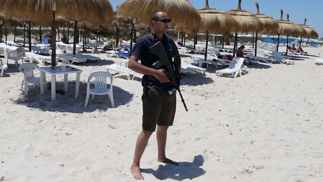 Polizist am Strand