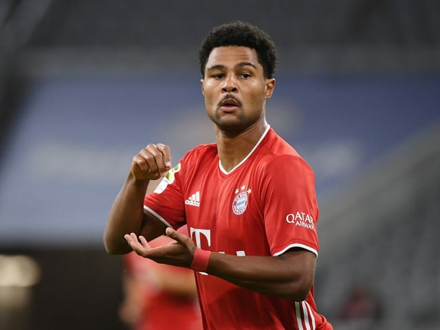 Serge Gnabry handles a pack of three. 