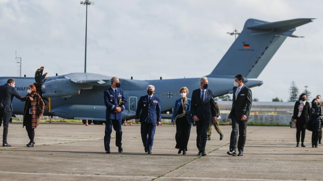 German doctors arrive at the airport in Portugal and are collected.