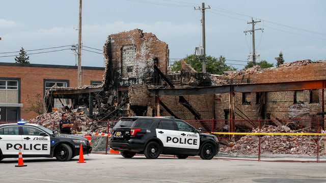 A building burned down during the violent protests in Kenosha.