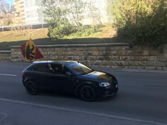 Car with the flag of Bern