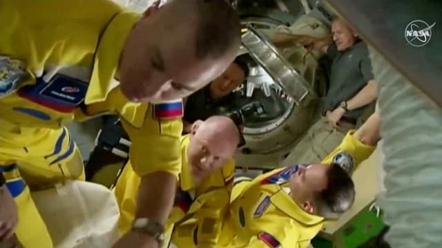 The three Russian cosmonauts on the ISS space station.