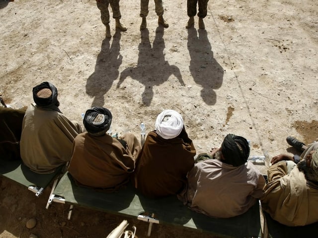 US-Soldaten sprechen mit Dorfältesten in der Provinz Helmand, 2010.