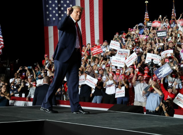 Trump cheers on supporters at a campaign event in Florida.