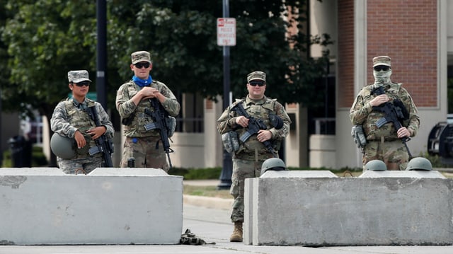 Members of the Wisconsin National Guard in front of the Kenosha County Public Safety Building, 