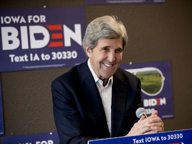 A smiling John Kerry at a Joe Biden election rally. 