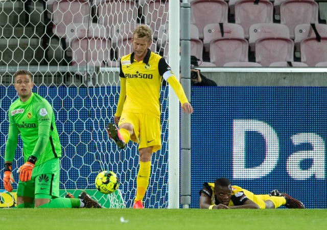 Captain Fabian Lustenberger hits the ball after conceding a goal.