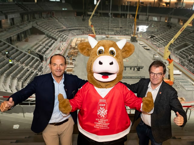 CO President Gian Gilli, Cooly Mascot and World Cup CO President Jean-Marie Viaccoz.