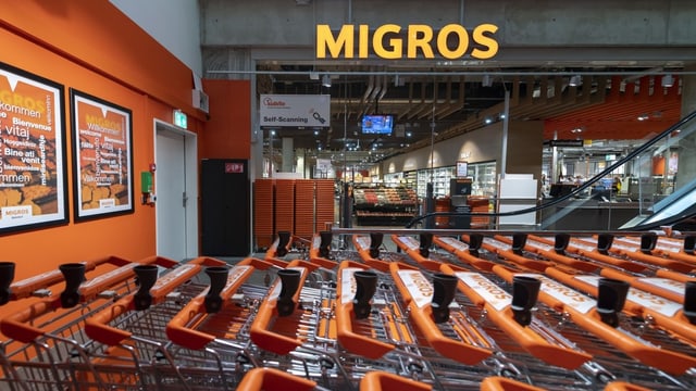 Migros-Schild.