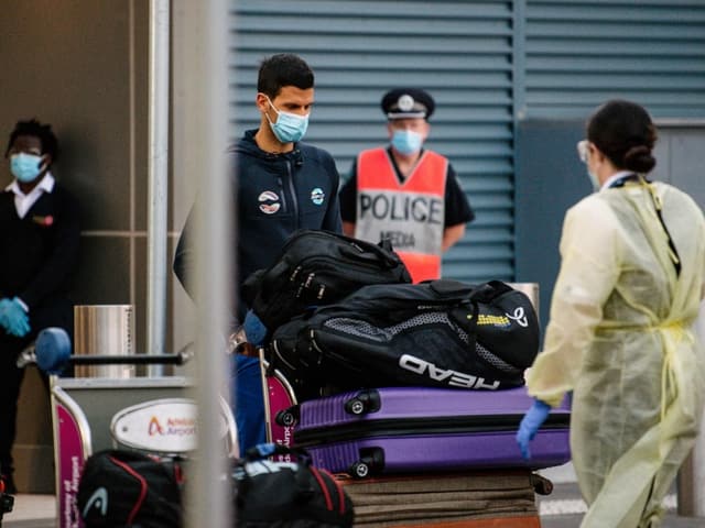 Novak Djokovic with masks