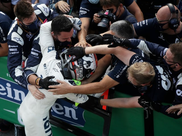 Pierre Gasly celebrates with his team.