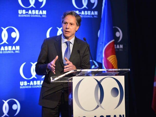 Anthony Blinken speaks at a podium. 