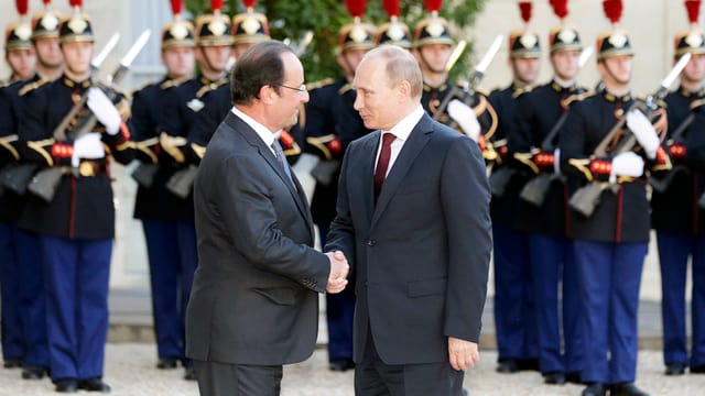 Frankreichs Präsident Hollande (links) und Russlands Staatschef Putin in Paris 