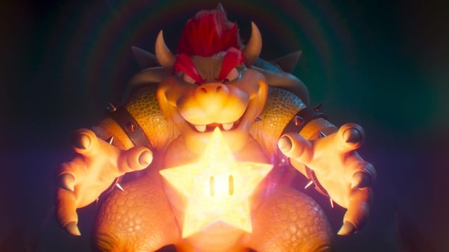 Der König der Koopas greift nach einem golden glänzenden, fünfzackigen Stern.