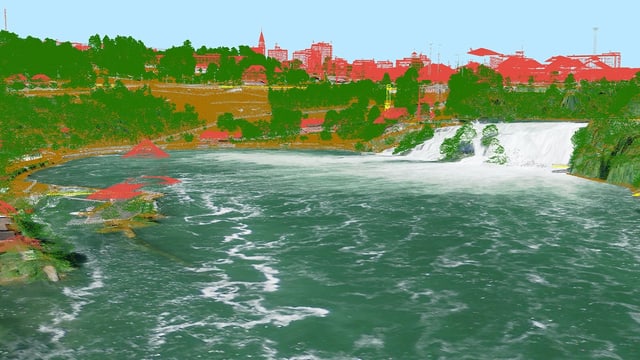 Eine Visualisierung von LiDAR-Daten beim Rheinfall. Die Landschaft erscheint in grünen, roten und orangen Farben.