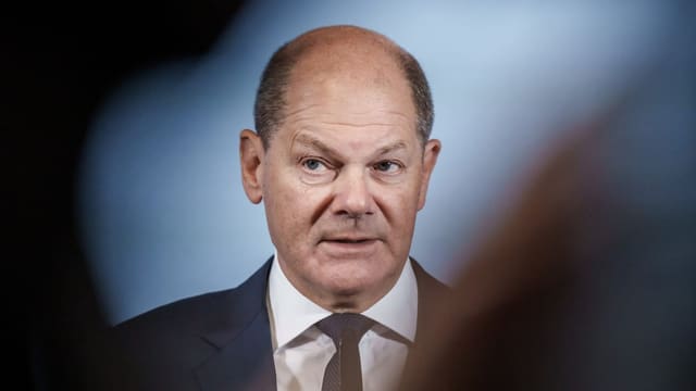 Olaf Scholz an einer Medienkonferenz in Berlin