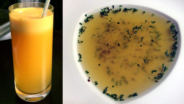 Ein Glas Orangensaft und ein Blick auf einen Teller mit klarer Suppe