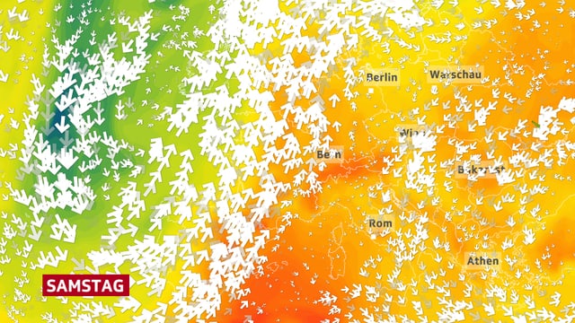 Bildausschnitt von Europa mit Windpfeilen und Farben für die unterschiedlich warmen Luftmassen. Die südwestliche Strömung bringt sehr warme Luft in den Alpenraum, auf dem Bild orange eingefärbt.