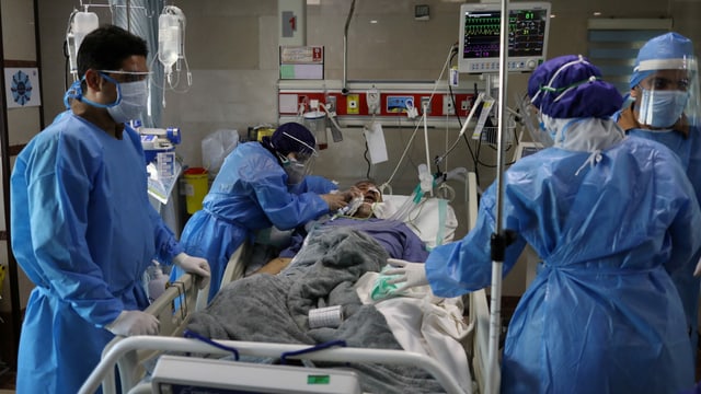 You can see doctors, nurses and patients in Tehran hospital.