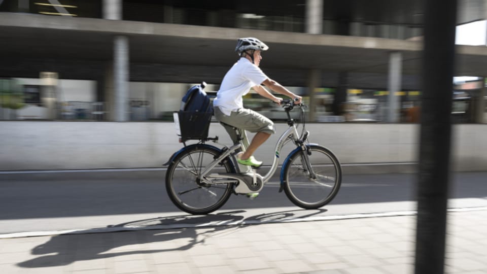 Geht es nach dem Kanton St. Gallen, sollen mehr Leute mit dem Fahrrad zur Arbeit statt mit dem Auto.