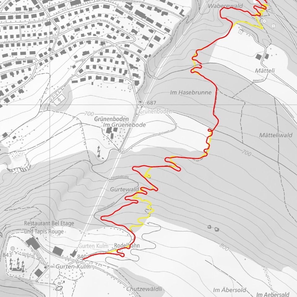 Topographische Karte mit rot-gelbem Wanderweg durch Wälder und Talsen.
