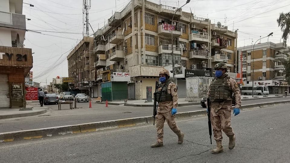 Kein Platz mehr für politische Proteste: Soldaten kontrollieren in Bagdad die Corona-Ausgangssperre.
