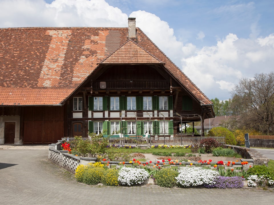 Geschmücktes Bauernhaus.