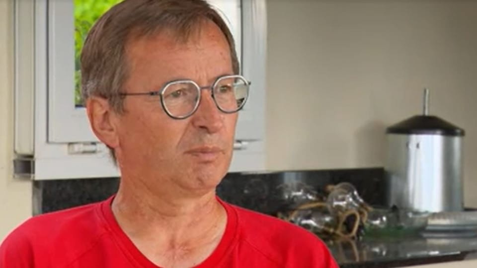 Bild von Daniel Pugin. Er trägt eine Brille und ein rotes T-shirt.