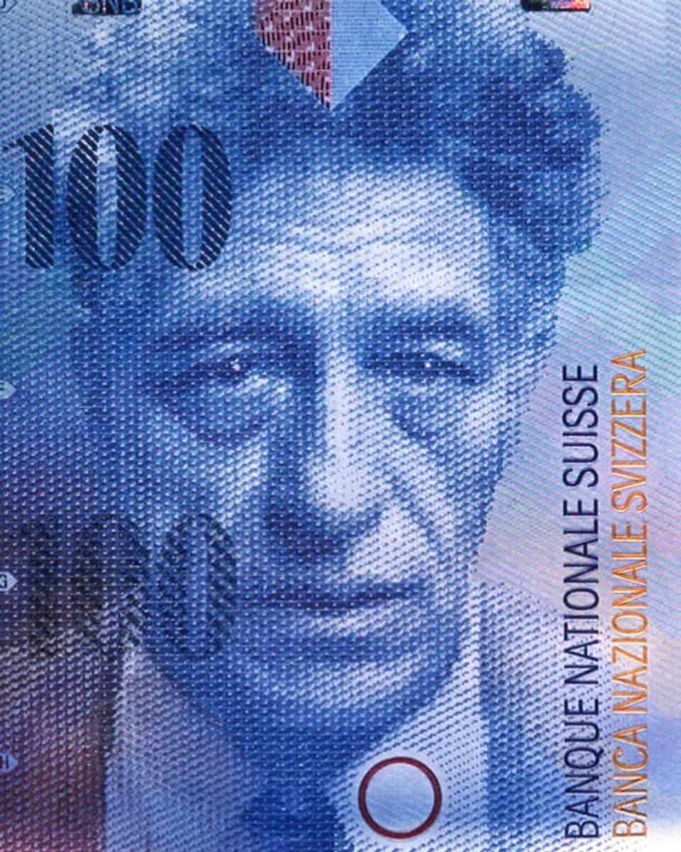 Blau-weisses Porträt eines älteren Mannes auf einer Banknote.