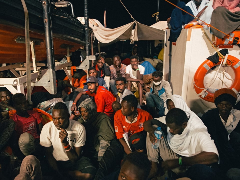 Afrikaner an Deck eines Schiffs.