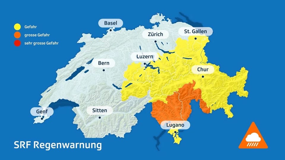 Karte der Schweiz mit Regenwarnungen in Gelb, Orange und Rot.