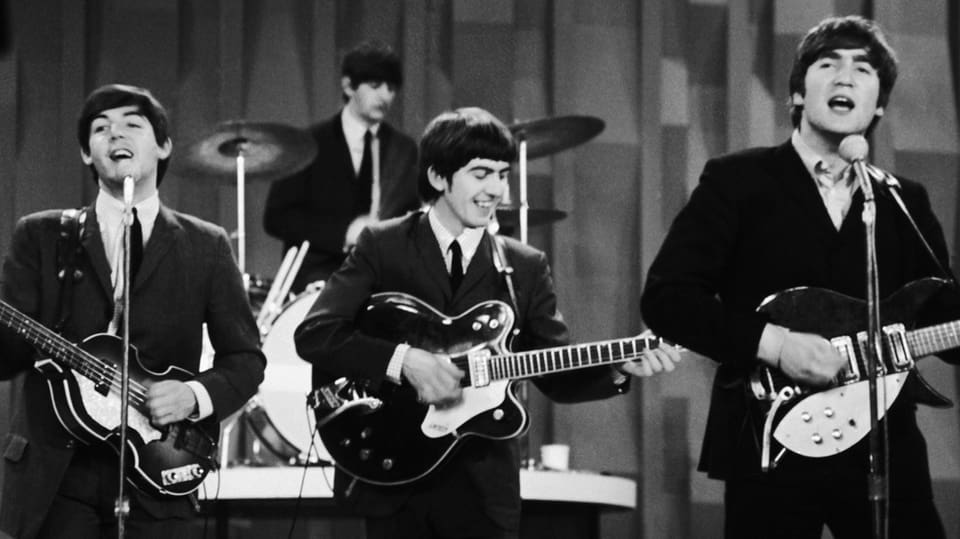 Die Beatles während eines Konzerts im Februar 1964.