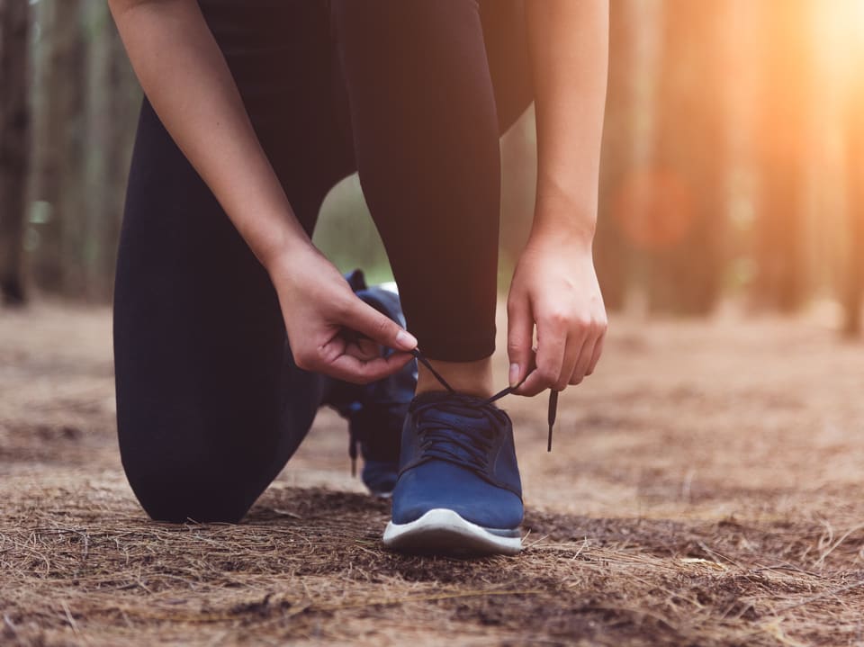 Joggerin im Wald