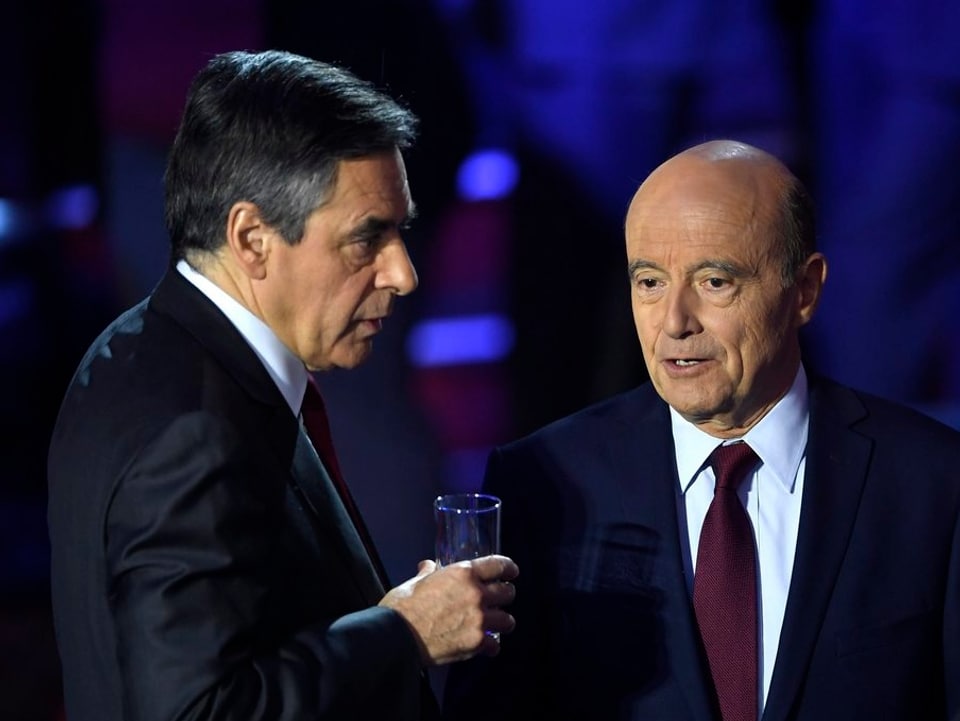 François Fillon und sein parteiinterner Konkurrent Alain Juppé (r.).